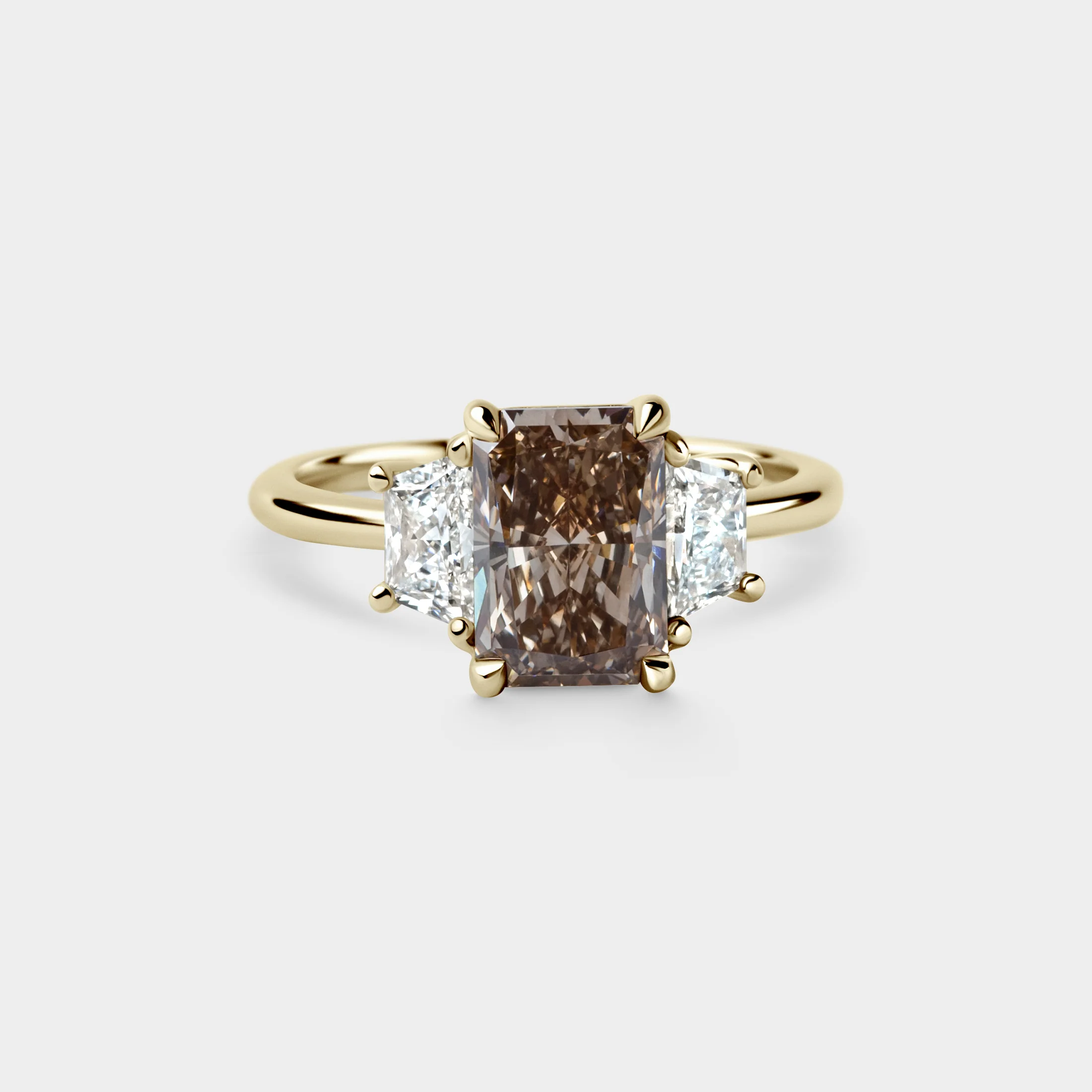 2.74ct Three Stone of Champagne Radiant & Trapezoid