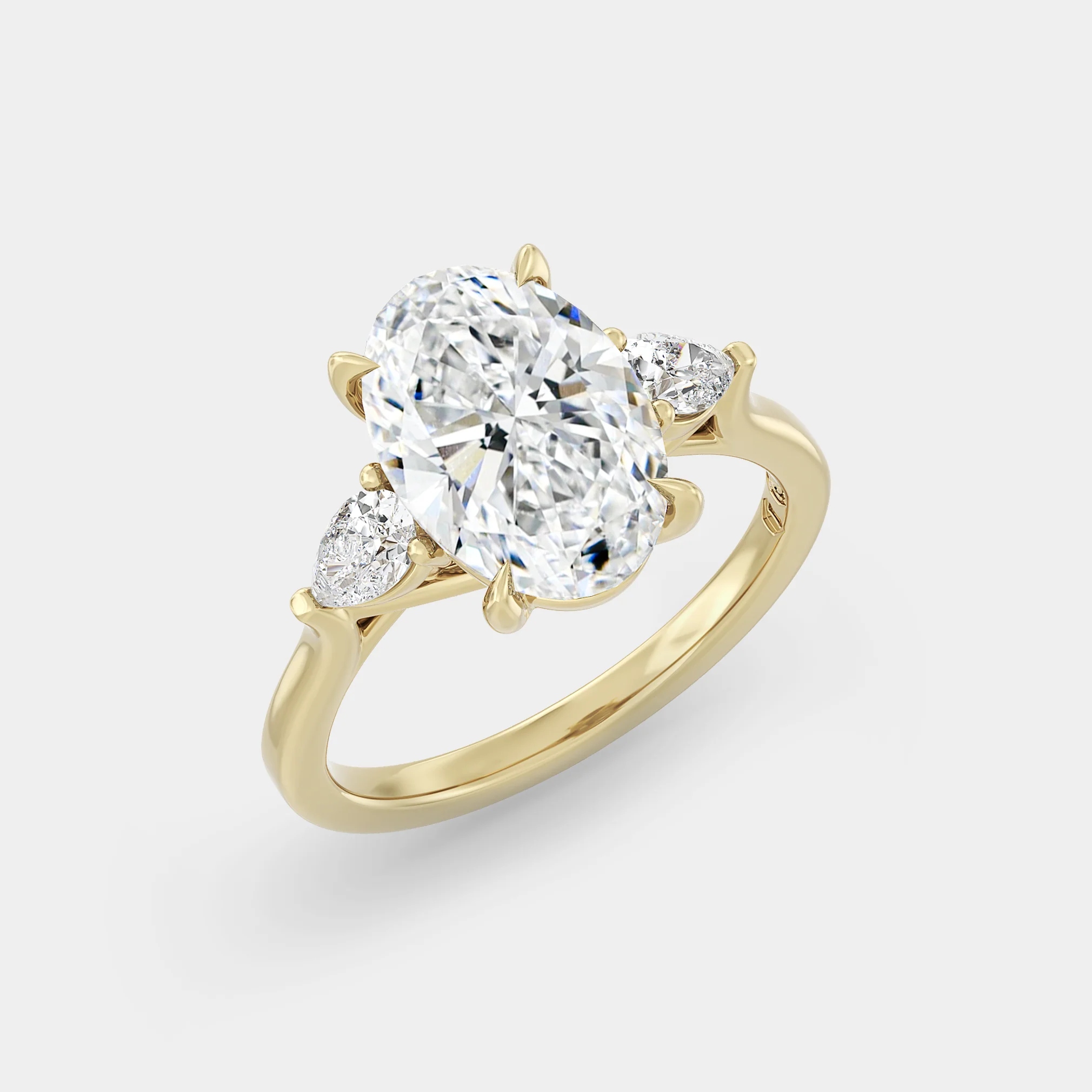 Trilogy of Lab Grown Oval & Pear, Trellis Setting - Image 3